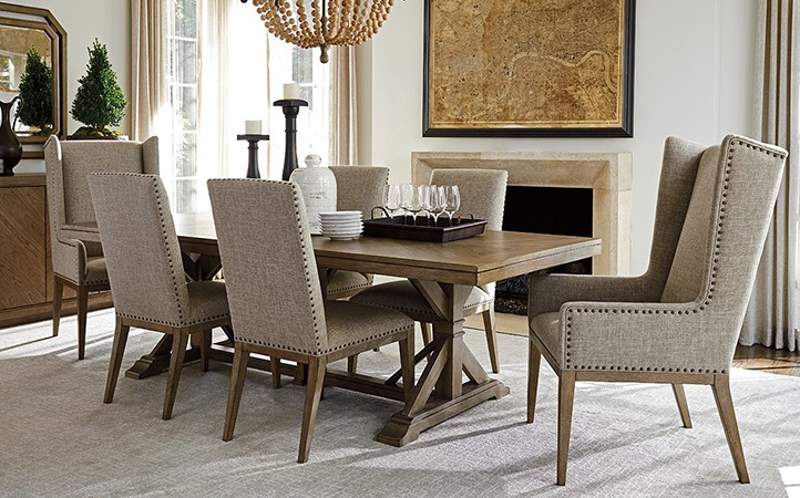 Cypress Point dining room features a brown dining table, six brown dining chairs.