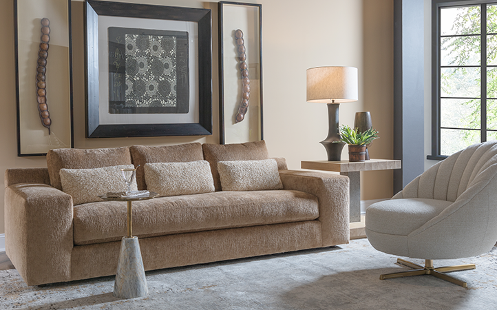 Artistica Upholstery scene featuring a sofa, a chair, one side table and an accent table.