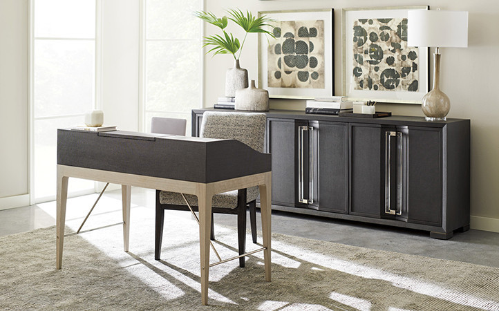 Anthology Linen Writing Desk - Linen wrapped end panels and deck with three storage drawers. The pull-out top creates a storage area with removable partitions and cord management. The fumed eucalyptus veneers and select hardwoods, also in the gray finish,