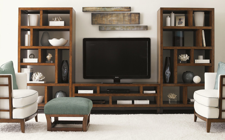 Two ideal bookcases for those who love to intersperse treasures with a media console in-between them.
