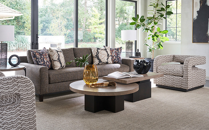The 62-inch Portofino nesting tables are comprised of separate pieces, but only sold as a pair. The tops feature a straight grain veneer pattern in the Senegal finish with 2-inch thick edges. Bases are in the Tunis finish.